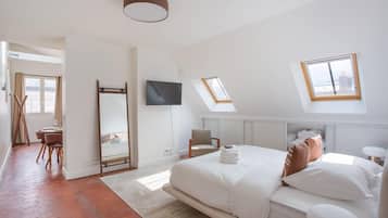 Apartamento | Espaço de trabalho para notebook, ferros/tábuas de passar roupa