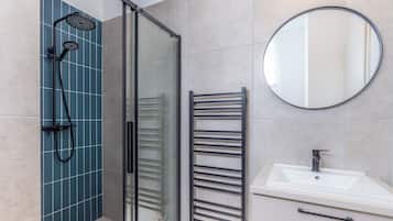 Standard Studio (Nemes Apartment The Petite) | Bathroom | Shower, hair dryer, towels, soap