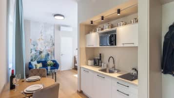 Standard Studio (Nemes Apartment The Petite) | Private kitchen | Fridge, microwave, oven, stovetop