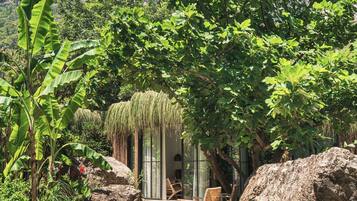 Deluxe Room, 1 Double Bed, Terrace, Garden View | In-room safe, bed sheets