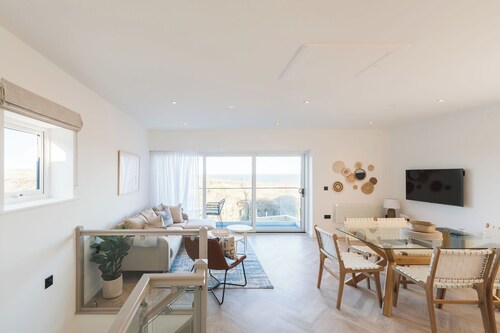 A modern costal townhouse in the scenic Bull Bay, offering stunning coastal views for up to 7 guests