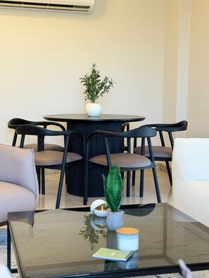 Deluxe Apartment, 2 Bedrooms, Balcony, City View | Living area