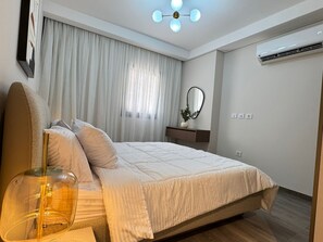 Deluxe Apartment, 2 Bedrooms, Balcony, City View | Living area - Mynt Stay zed west Residence (Sheikh Zayed City)