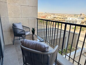 Deluxe Apartment, 2 Bedrooms, Balcony, City View | Terrace/patio - Mynt Stay zed west Residence (Sheikh Zayed City)