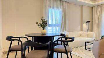 Deluxe Apartment, 2 Bedrooms, Balcony, City View | Living area