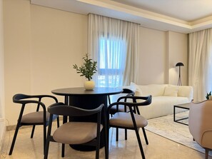 Deluxe Apartment, 2 Bedrooms, Balcony, City View | Living area - Mynt Stay zed west Residence (Sheikh Zayed City)