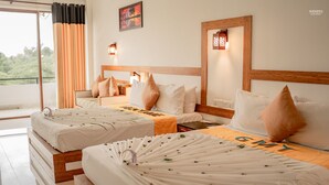 A hotel room with two beds, a balcony, and a view of greenery. - G.M.T. Sorabora Village Hotel (Mahiyanganaya)