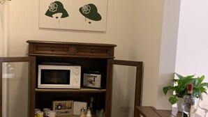 A kitchen with a microwave, toaster, and various kitchenware. - [5 min from Uffizi] Lady Suite in Center, Wifi, Comfort (FLORENCE)