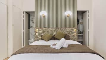 Apartment | Laptop workspace, iron/ironing board, bed sheets