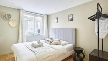 Apartment | Laptop workspace, iron/ironing board, bed sheets