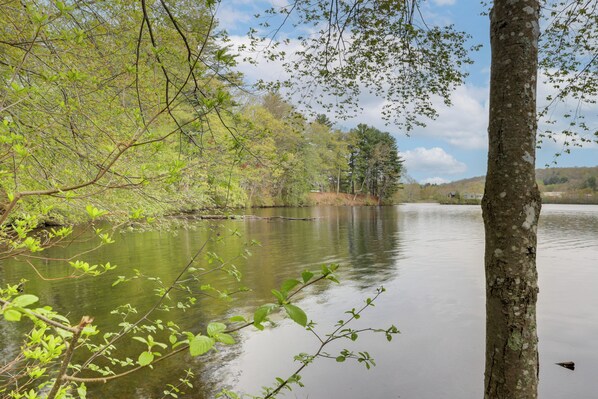 A calm lake surrounded by trees. - < 3 Mi to Uconn: Peaceful Home on Pine Lake (Coventry)