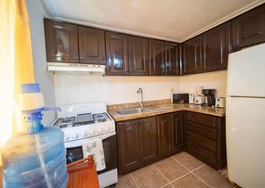 Fridge, microwave, stovetop, cookware/dishes/utensils