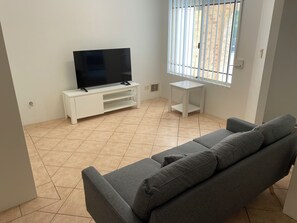 Familienhaus, Gartenblick | Wohnbereich | Flachbildfernseher