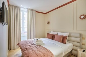 Apartment | Laptop workspace, iron/ironing board, bed sheets