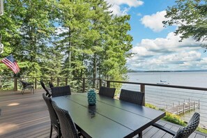 Outdoor dining - Lake Winnipesaukee Waterfront Rental in Gilford NH Private Dock Sleeps 12 (Gilford)