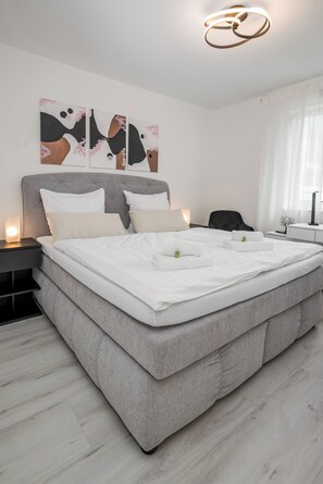1 bedroom, desk, iron/ironing board, travel cot