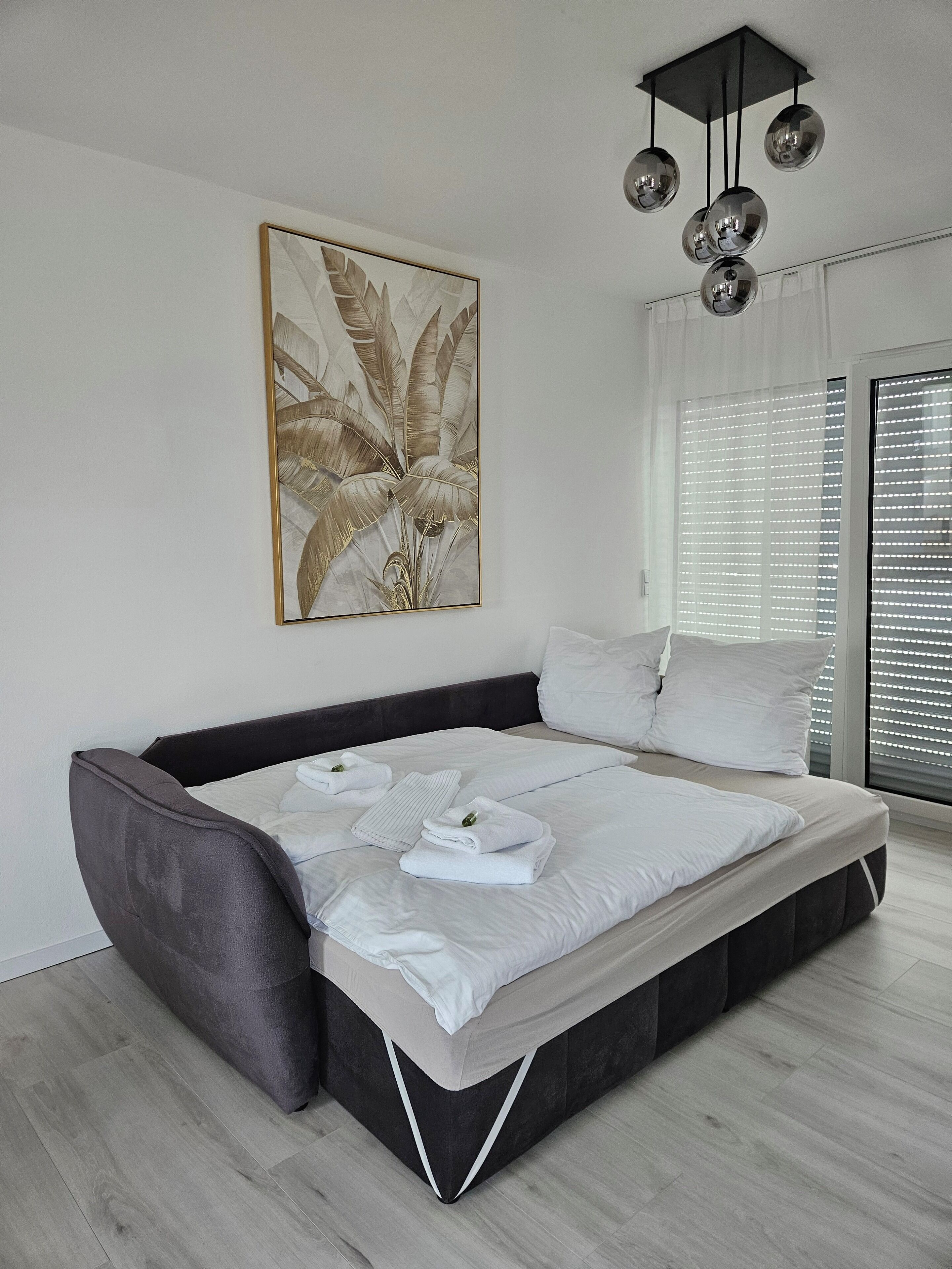 1 bedroom, desk, iron/ironing board, travel crib