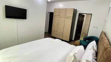 Family Apartment, Balcony, City View | 2 bedrooms, in-room safe, desk, laptop workspace
