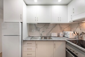 Fridge, microwave, stovetop, electric kettle