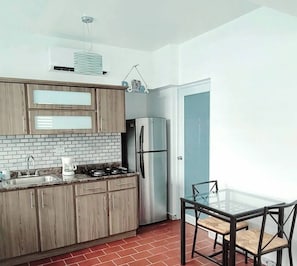 Fridge, microwave, stovetop, coffee/tea maker