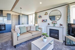 Televisión, reproductor de DVD y oficina 