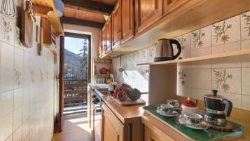 Appartement Standard, plusieurs chambres (Appartamento Beau Soleil) | Cuisine privée | Réfrigérateur, four, plaque de cuisson, lave-vaisselle