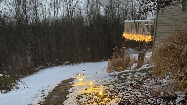 A pathway with snow-covered ground and lights along the path. - Cozy SAFE 1 BR Private apartment Traveling Professionals near skiing Hospitals (Exeter)