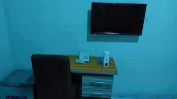 Deluxe Room, Balcony, City View | Desk, laptop workspace, free WiFi