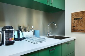 Apartment | Private kitchen | Stovetop, cookware/dishes/utensils