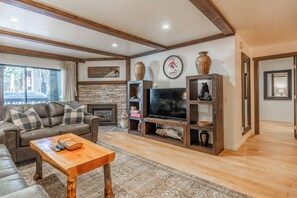 Smart TV, fireplace, books