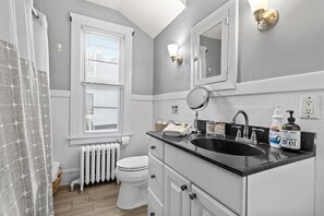 Hair dryer, towels, soap, toilet paper