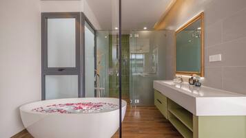 Deep soaking tub, rainfall showerhead, free toiletries, hair dryer