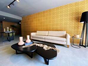 Superior Apartment | Living area | Flat-screen TV - Flat FM20 Cabo Branco L6 - By Almare (João Pessoa)