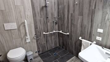 Basic Twin Room | Bathroom | Shower, hair dryer, bidet, towels