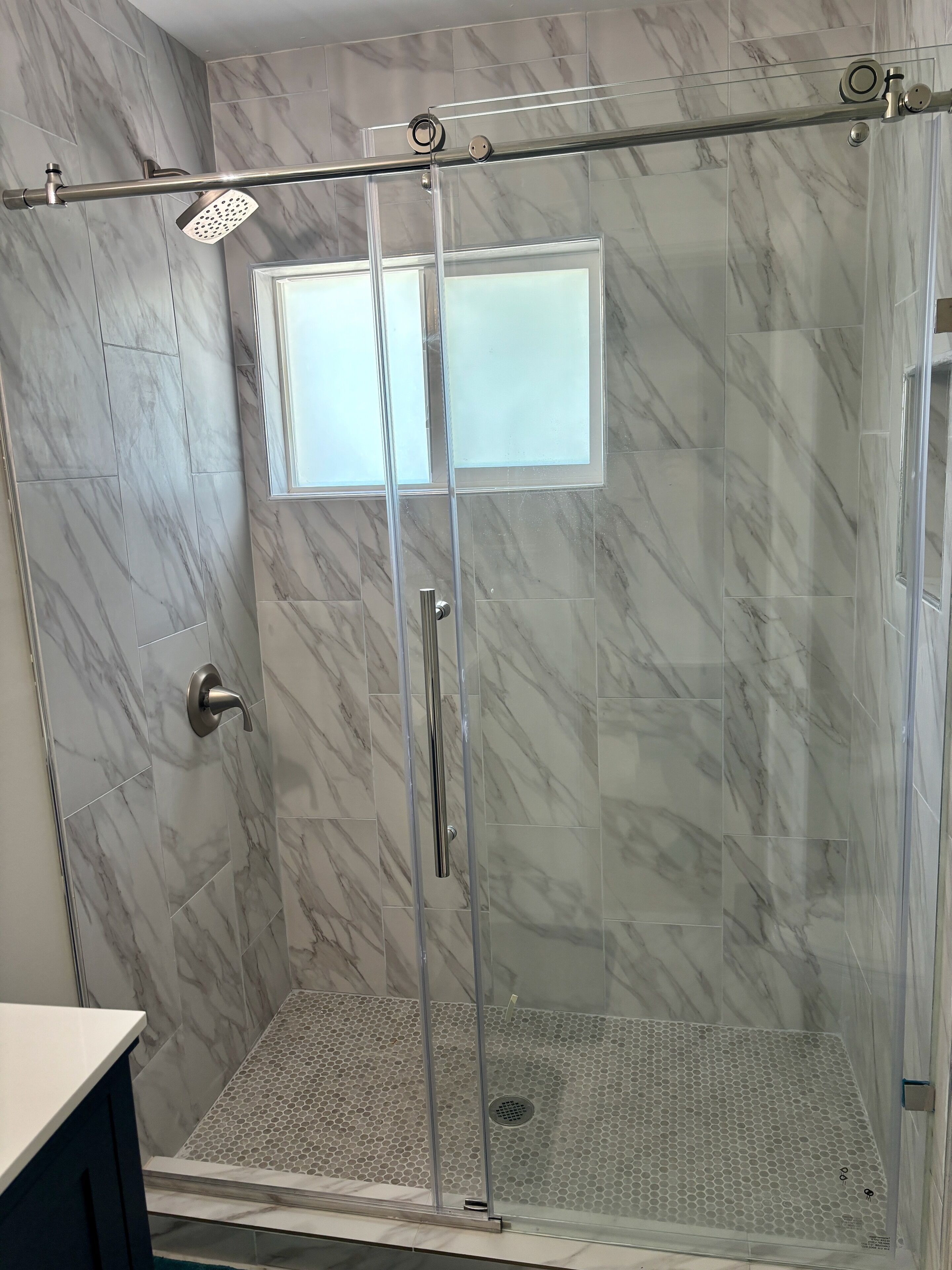 Shower, towels, toilet paper