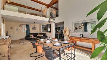 Villa, Garden View | Living area | 120-cm LED TV with cable channels