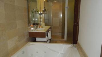Jetted bath, hair dryer, towels, soap