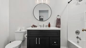 Shower, towels, soap, toilet paper