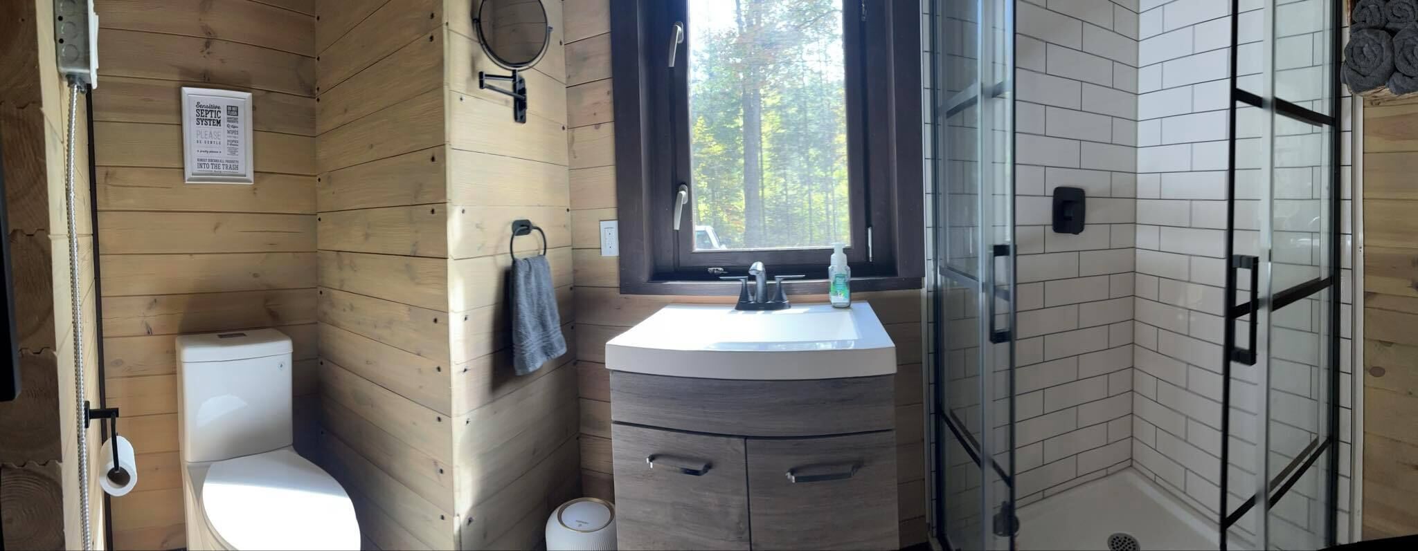 Shower, towels, soap, toilet paper