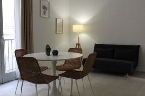 Deluxe Apartment, City View | Living area | 32-inch flat-screen TV with digital channels, TV