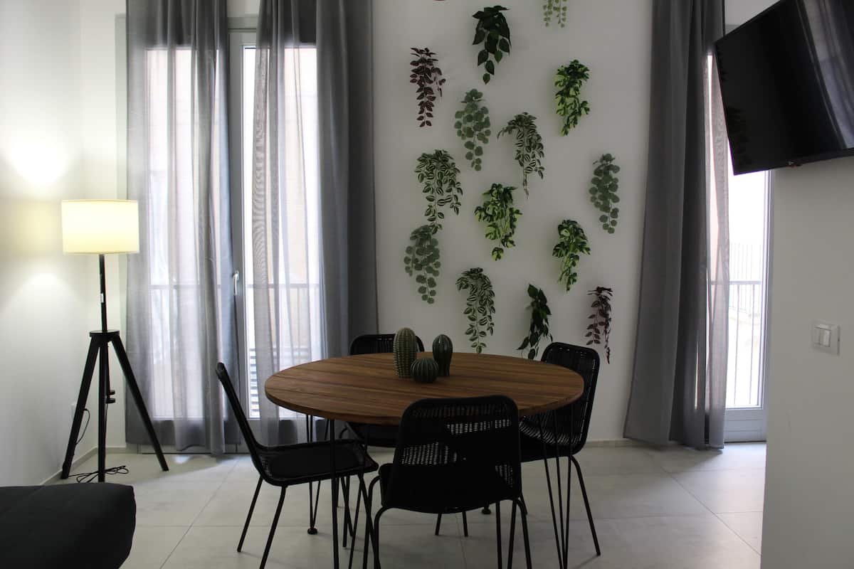 Comfort Apartment, City View | Living area | Flat-screen TV