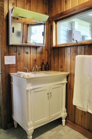 Shower, towels, soap, toilet paper