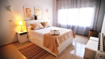 2 dormitorios, tabla de planchar con plancha, wifi gratis y ropa de cama