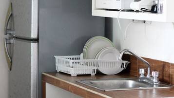 Microwave, stovetop, coffee/tea maker, blender