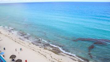 On the beach, sun loungers