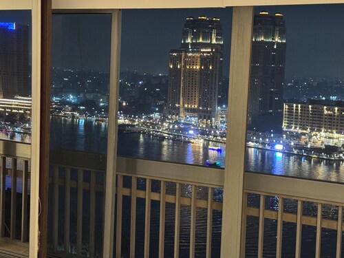 Cairo panoramic Nile window has a 3-bedroom, wide reception high speed WiFi, AC.