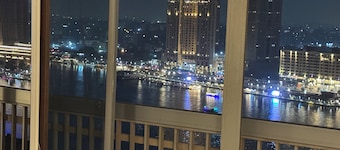 Cairo panoramic Nile window has a 3-bedroom, wide reception high speed WiFi, AC.