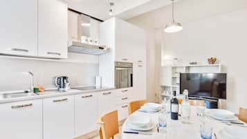 Comfort Apartment, Balcony, Garden View | Minibar, individually furnished, desk, blackout drapes