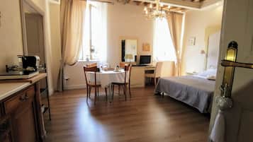 Deluxe Quadruple Room, 2 Bedrooms, Non Smoking, Air conditioning | Minibar, individually furnished, desk, blackout drapes