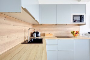 Fridge, microwave, coffee/tea maker, toaster